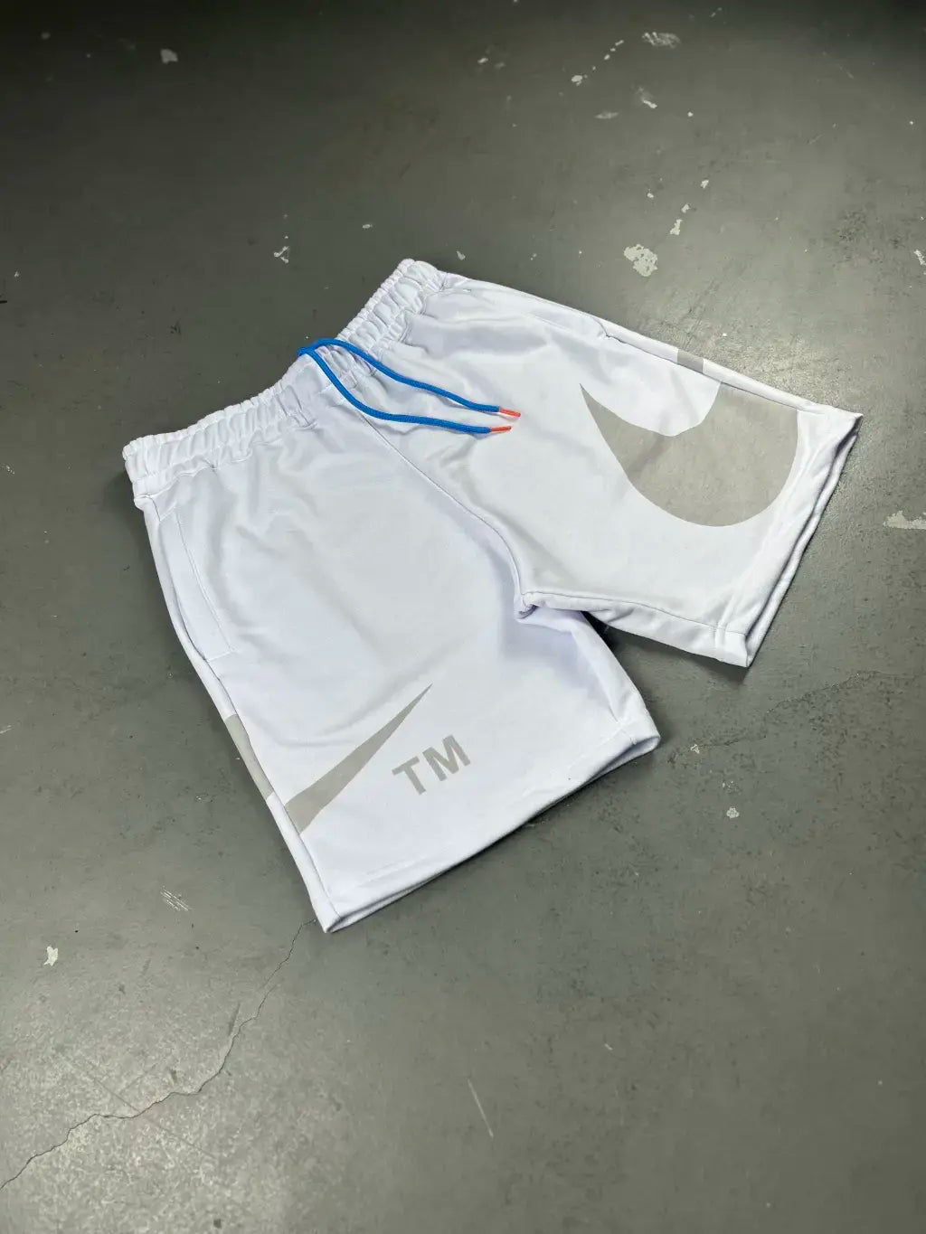 BERMUDA MOLETOM NIKE BIG SWOOSHᵀᴹ