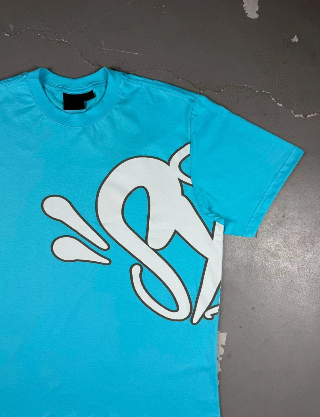 CONJUNTO SYNA WORLD LOGO