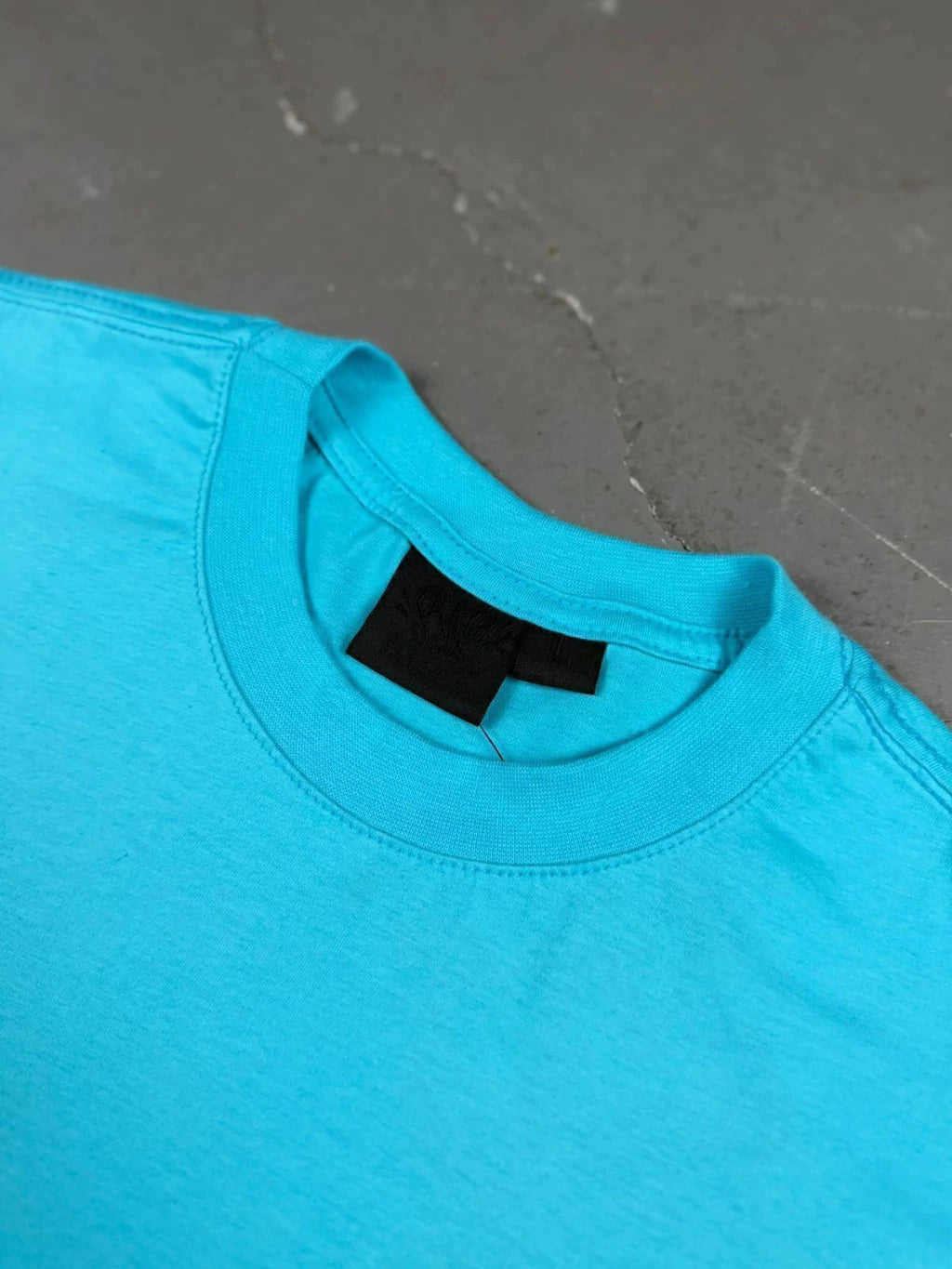 CAMISETA SYNA WORLD LOGO