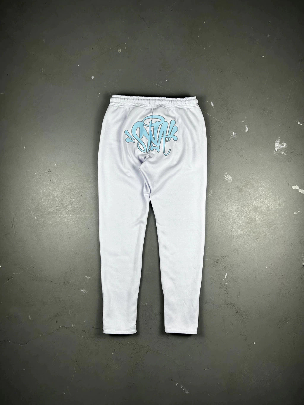 CONJUNTO SYNA WORLD LOGO