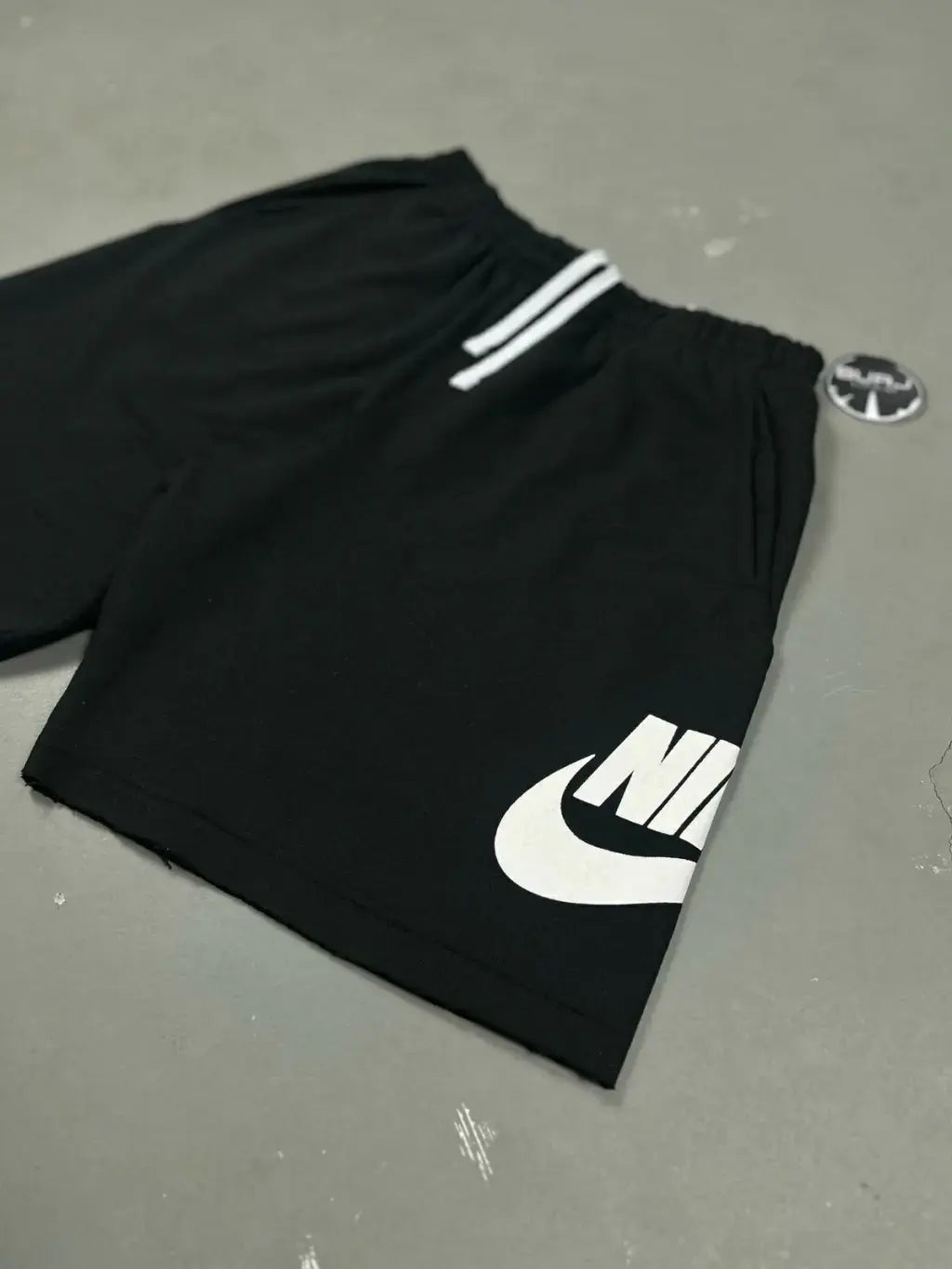 BERMUDA MOLETOM NIKE ICON FUTURA