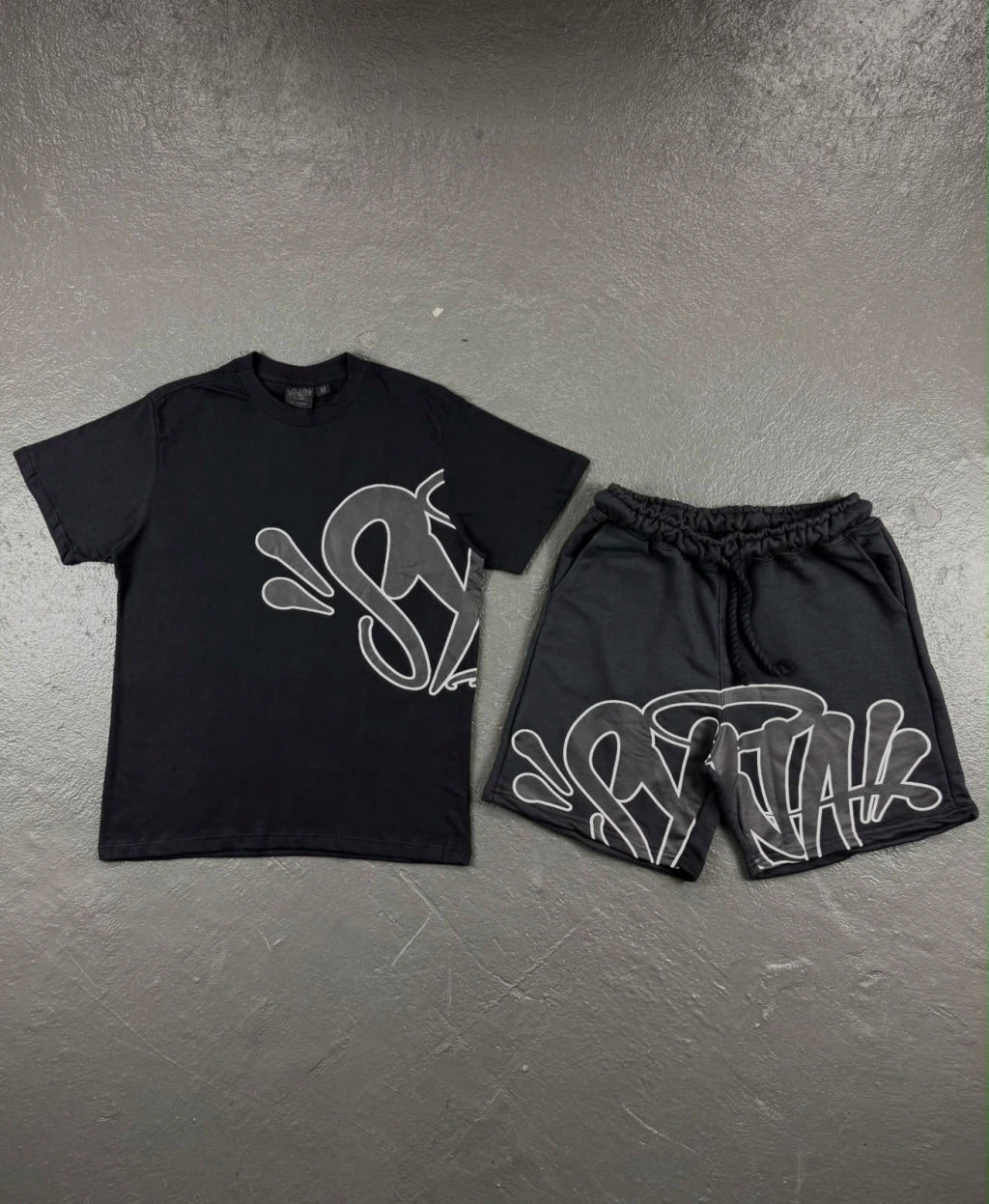 CONJUNTO SYNA WORLD LOGO