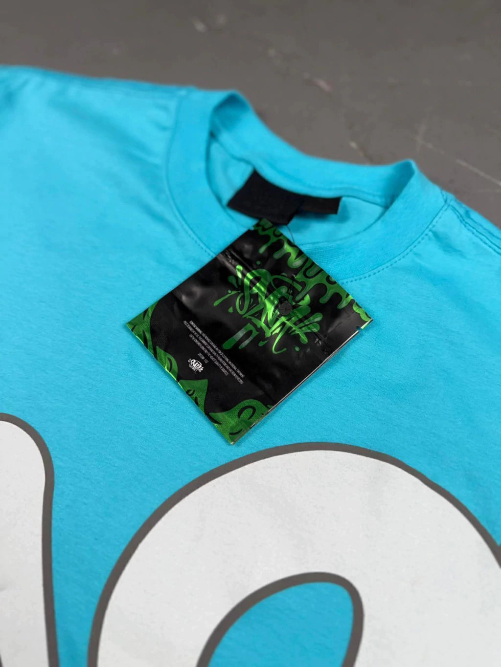 CAMISETA SYNA WORLD LOGO